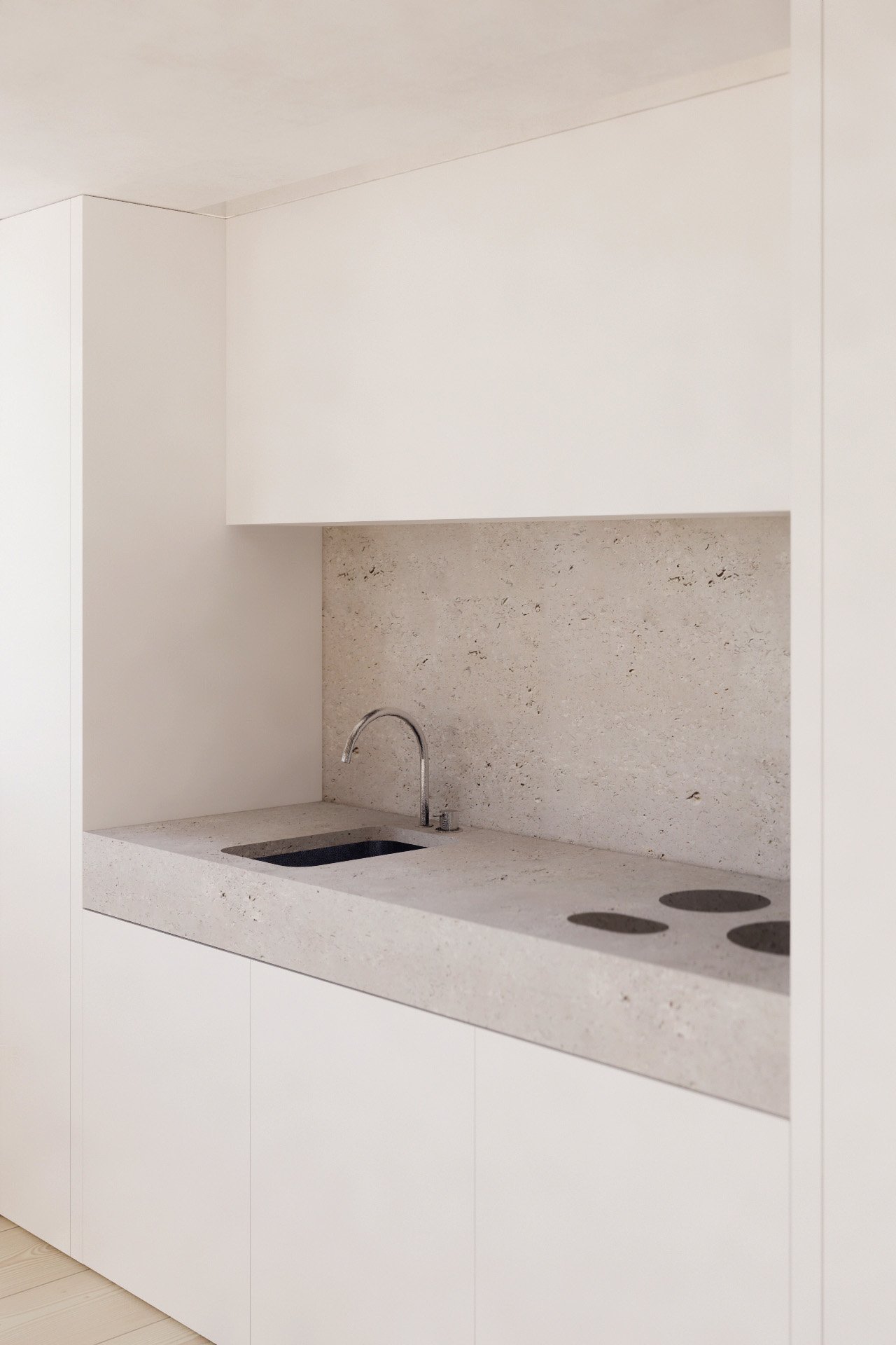 Kitchen in chelsea flat refurbishment with stone and wood