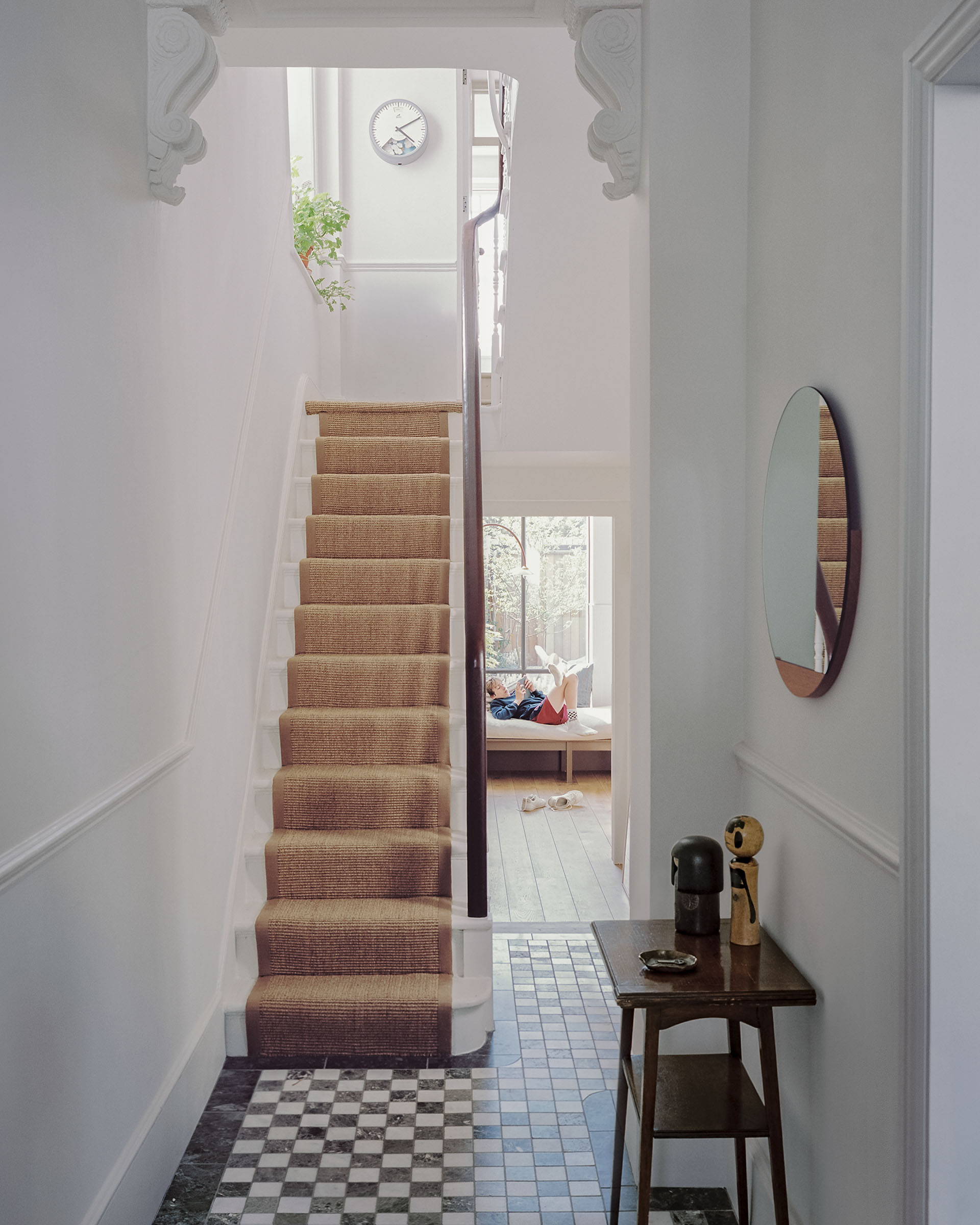 Victorian tiled hallway london with stone, carpet runner and cornice