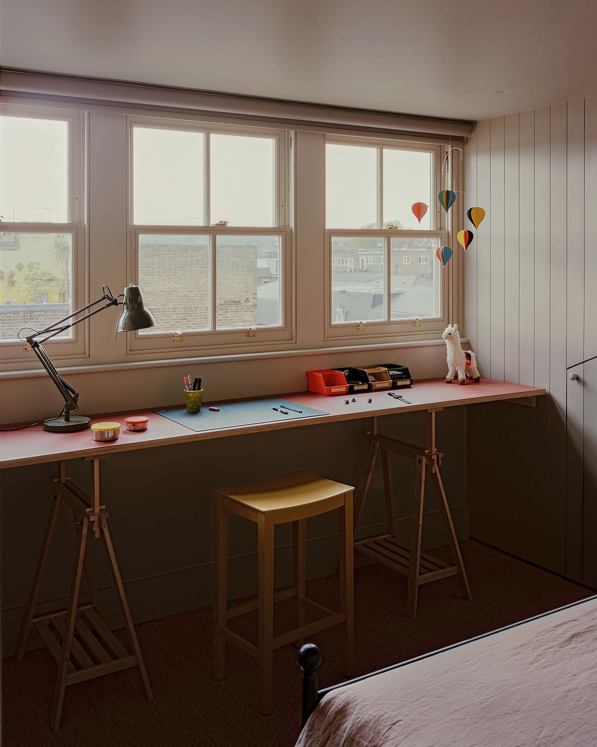 architect designed loft conversion kentish town, kids bedroom with crafting table