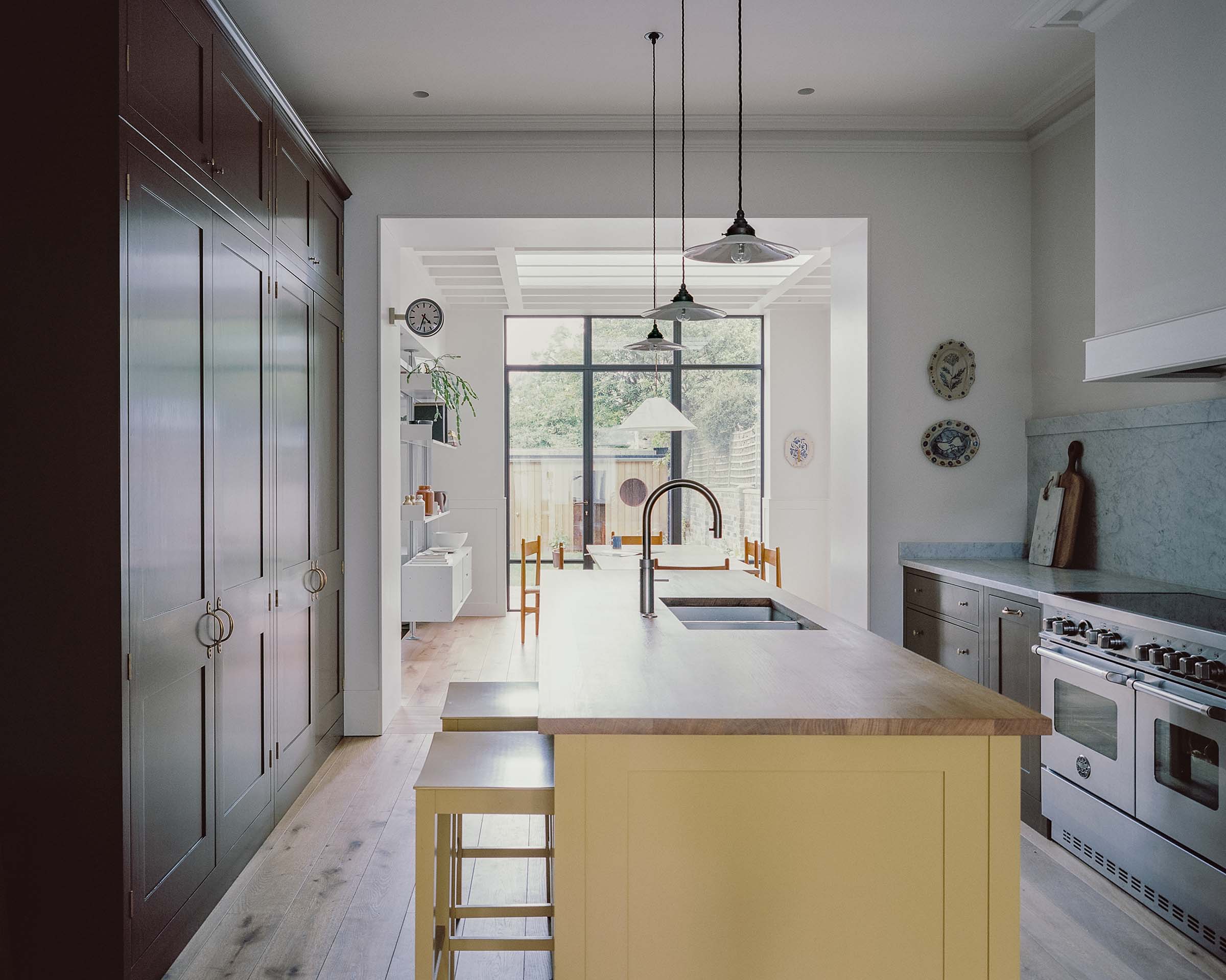 kentish town house traditional kitchen with yellow island unit