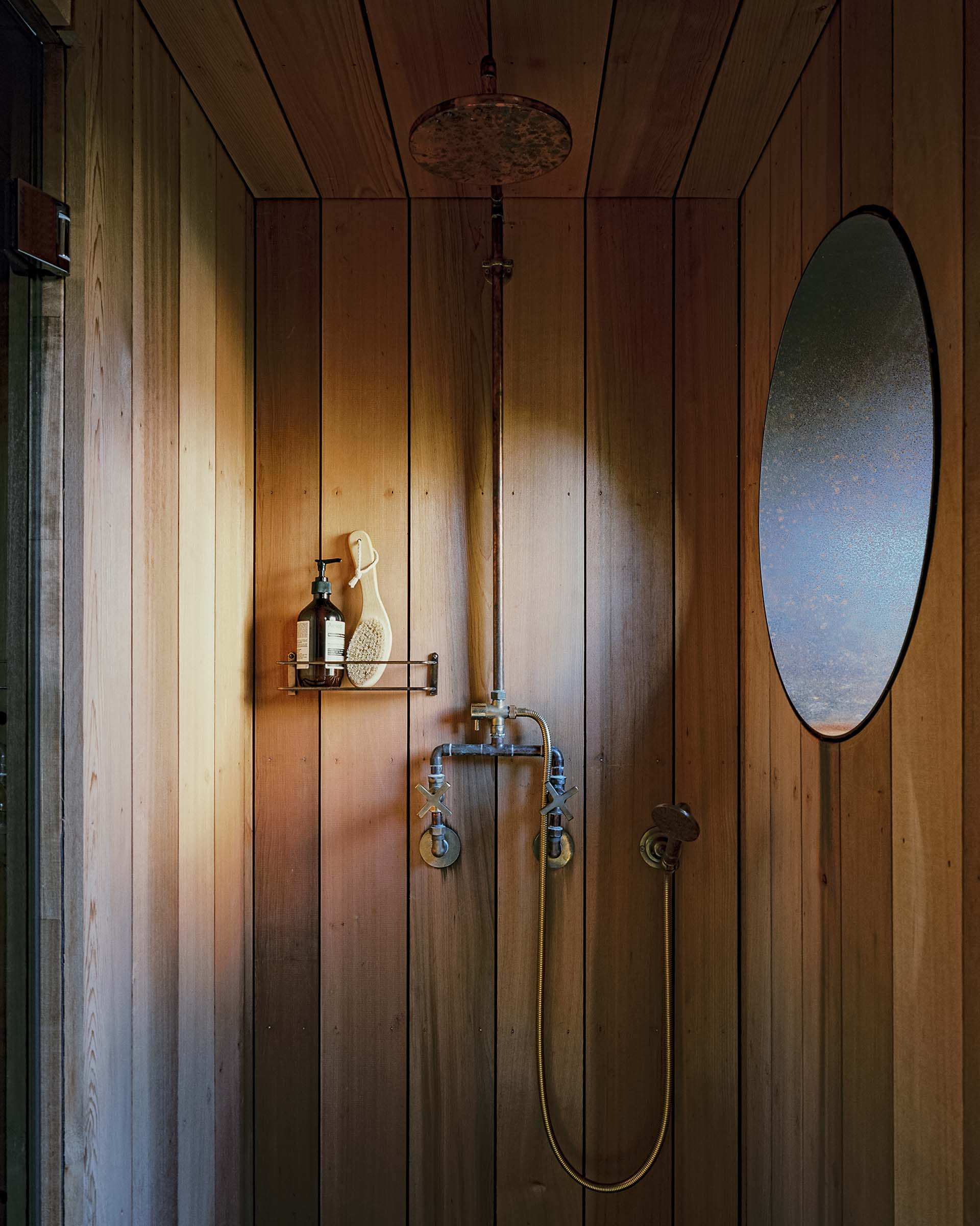 sauna outdoor shower london garden with circular window