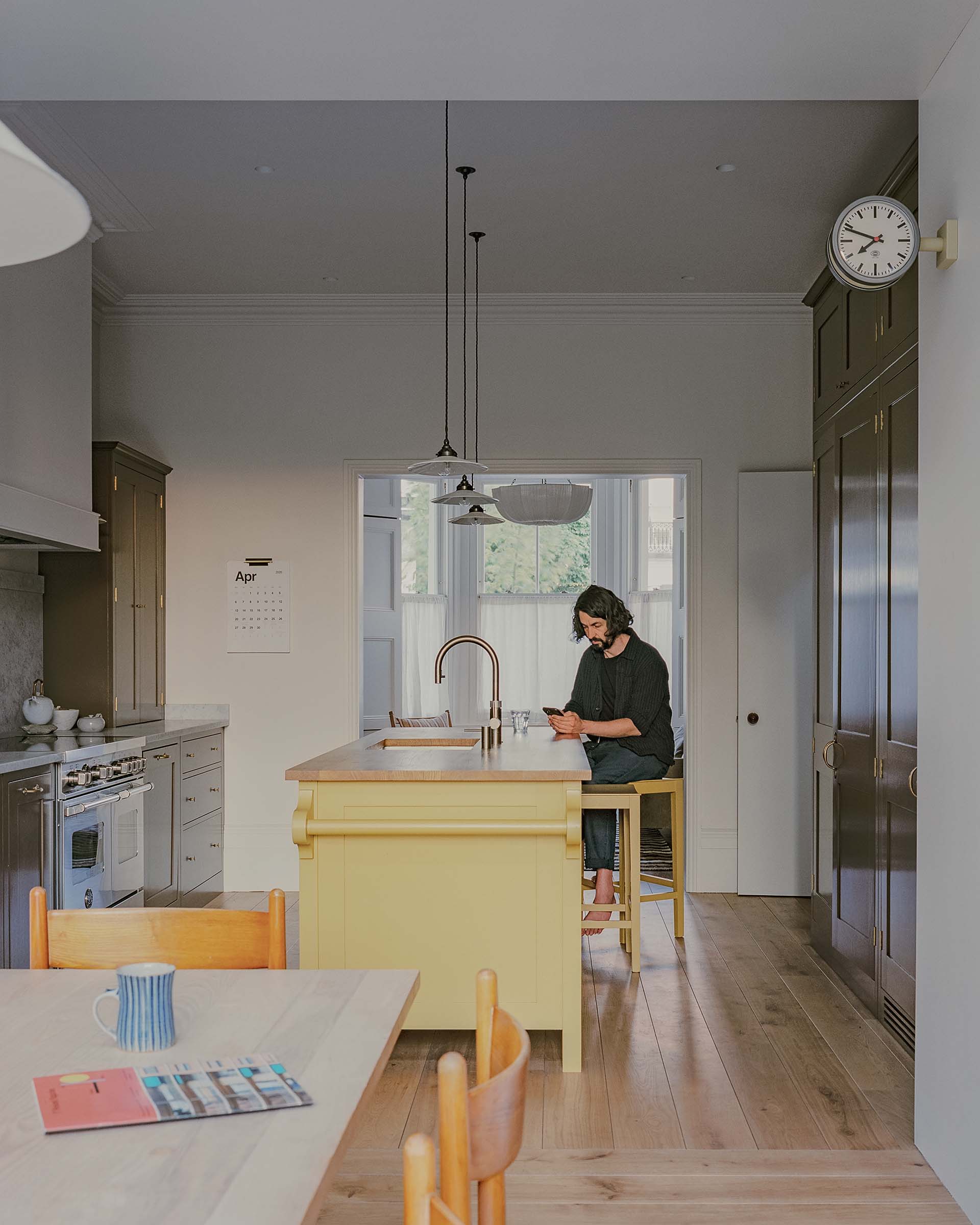 traditional shaker kitchen colour with dining table and oak wood floor