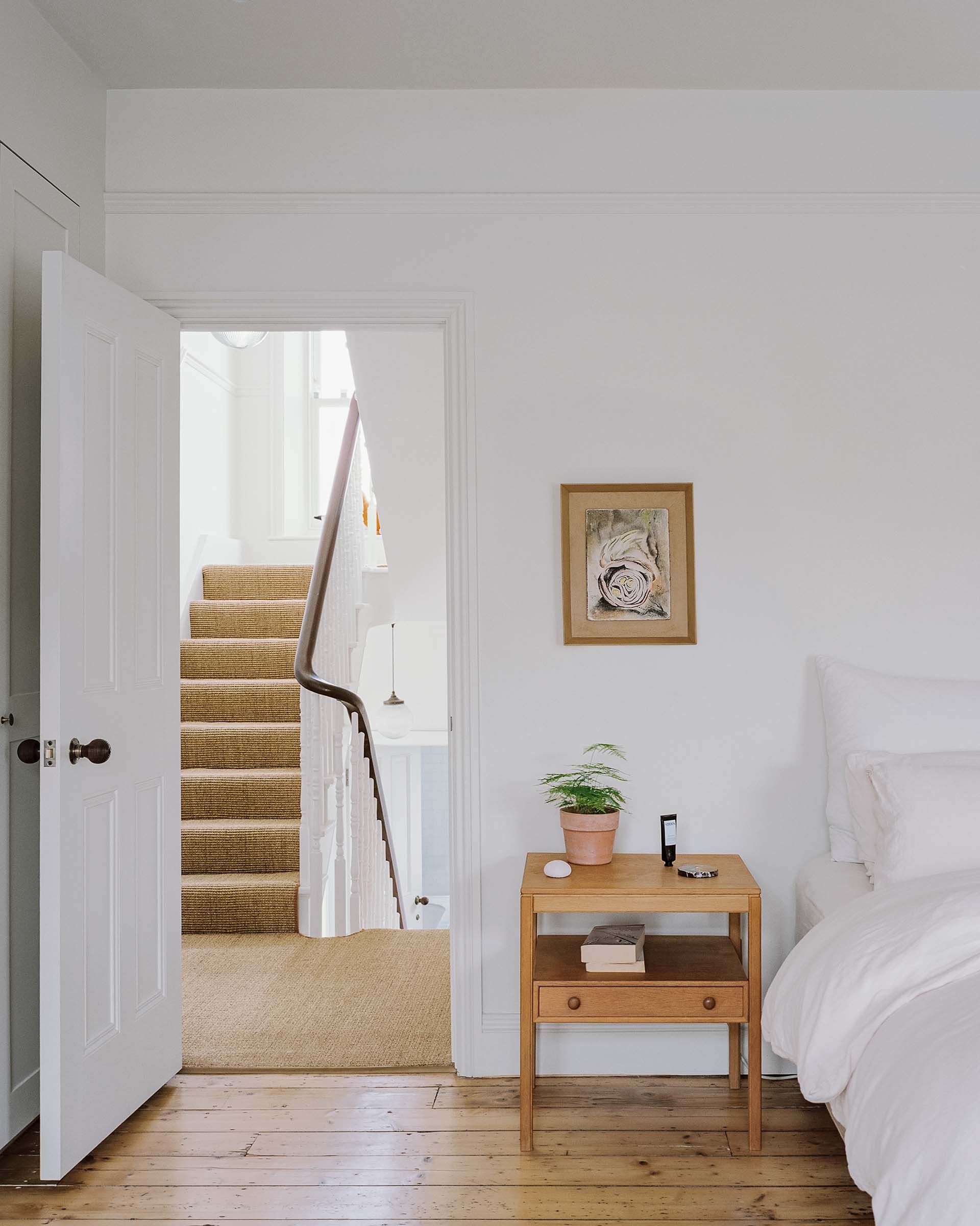 victorian bedroom white paint and sanded wood floor