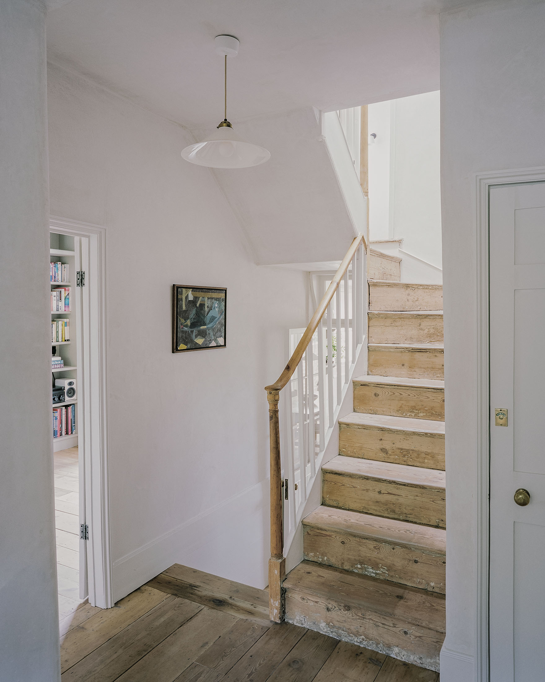 Georgian house with refurbished original timber staircase and lime plaster walls
