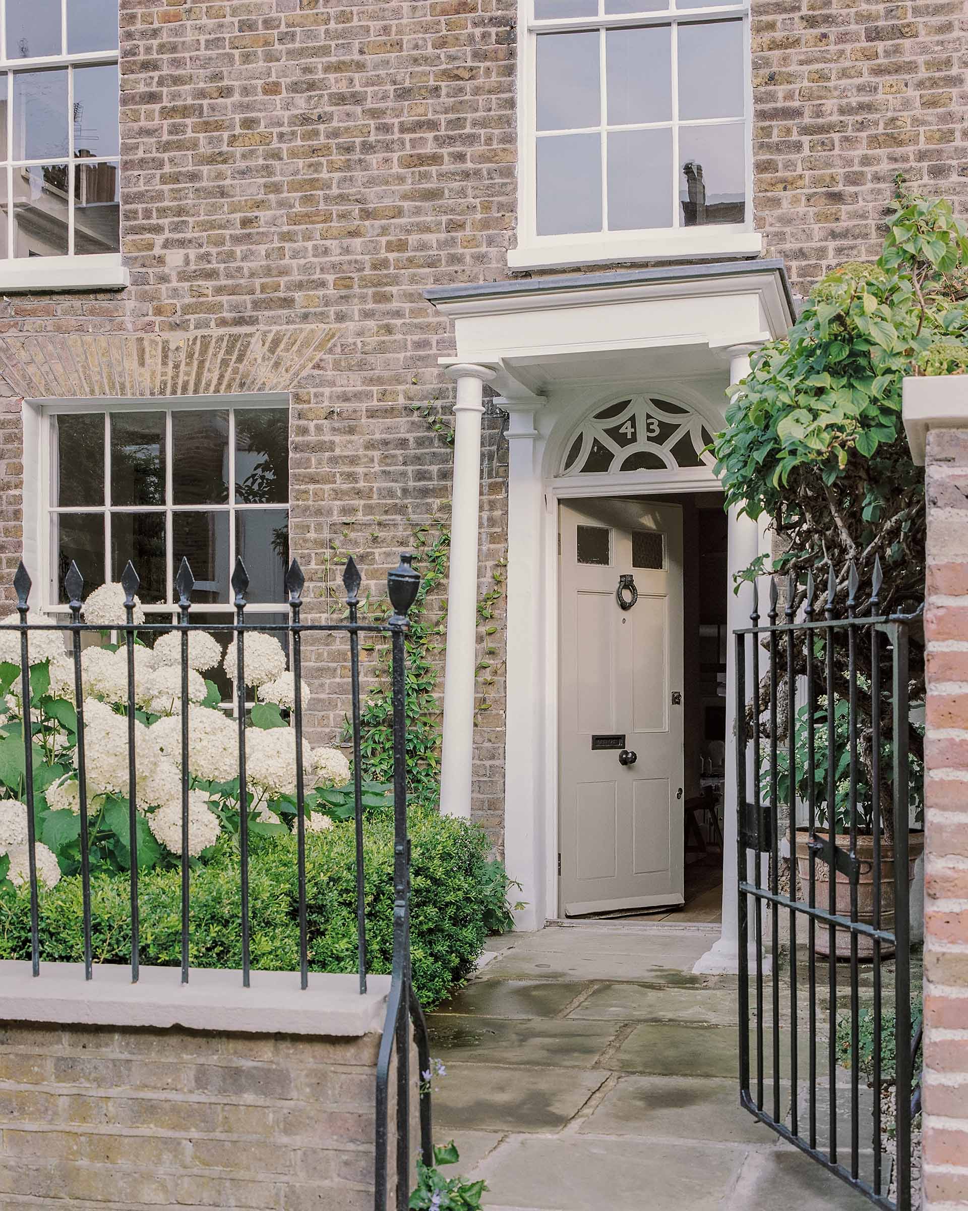 Hampstead house traditional architect front door with fanlight and entrance canopy hood