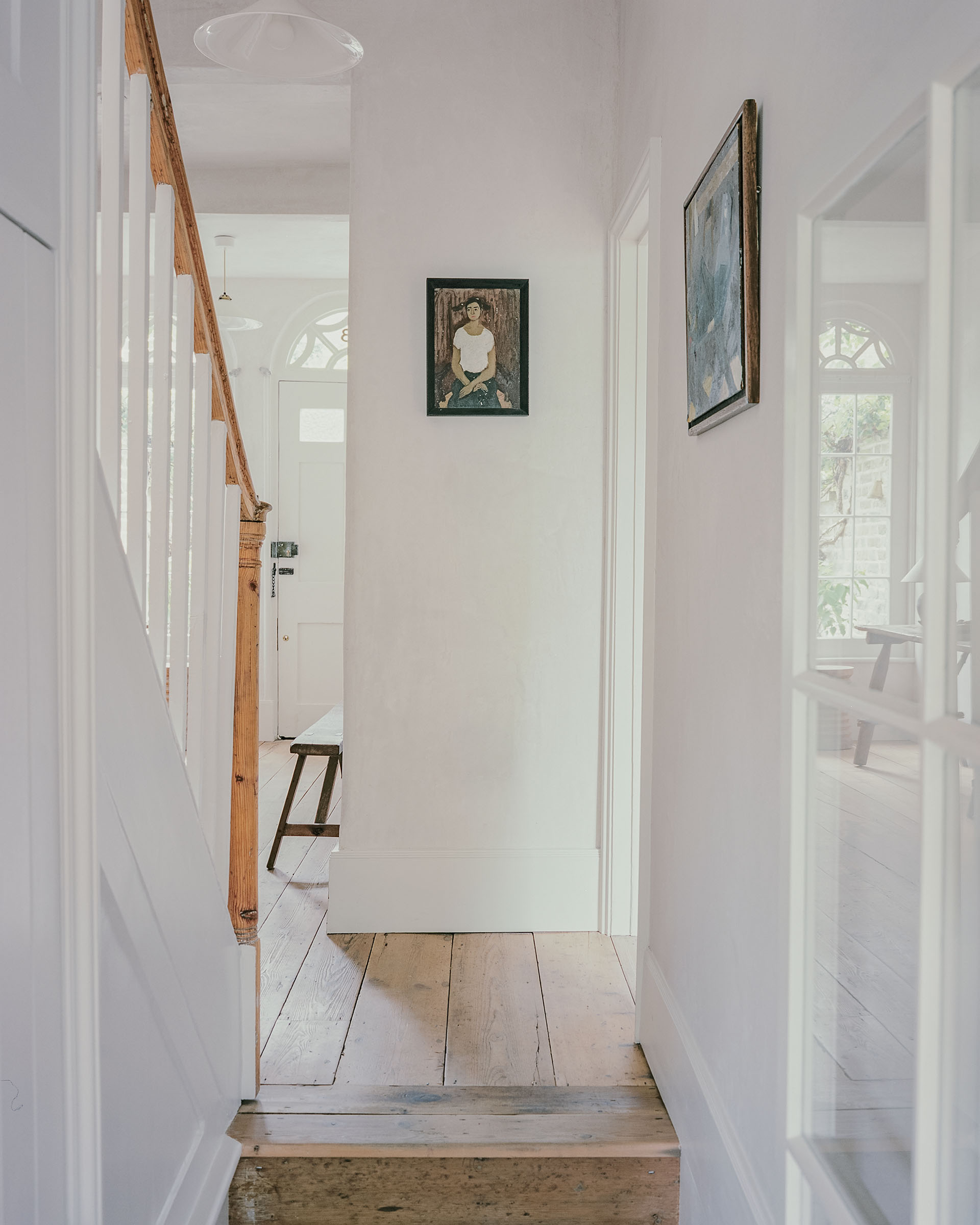 London georgian house entrance hall with original pine floor and lime plaster walls